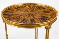 A Pair of Louis XVI Style Gilt Bronze and Tiger's Eye Tables in the Manner of Adam Weisweiler