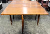 An American Cherry Drop Leaf Table Height 20 1/4 x width 46 x depth 20 3/4 inches (closed). — 19TH CENTURY