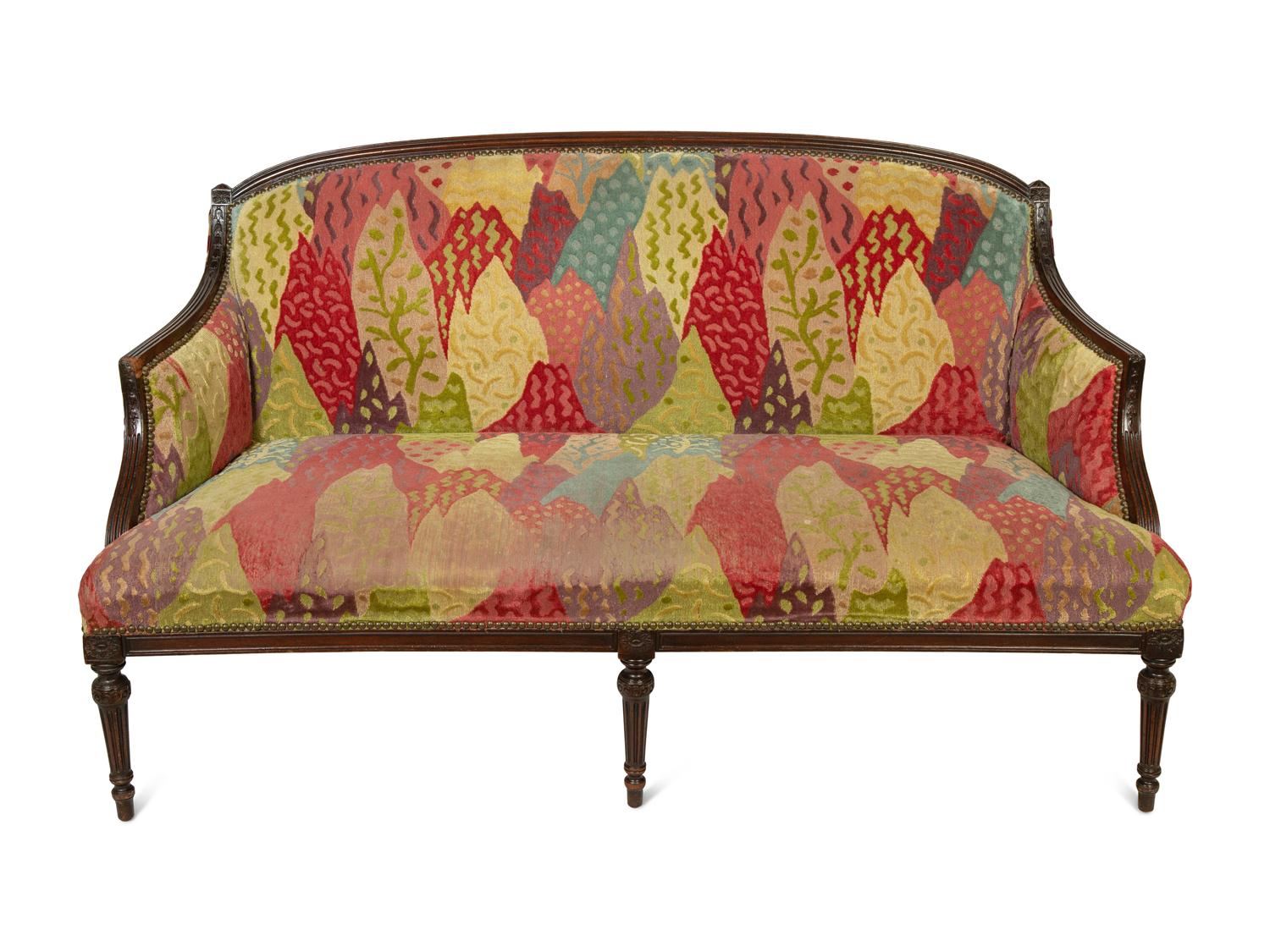 A Pair of Louis XVI Style Mahogany Settees
