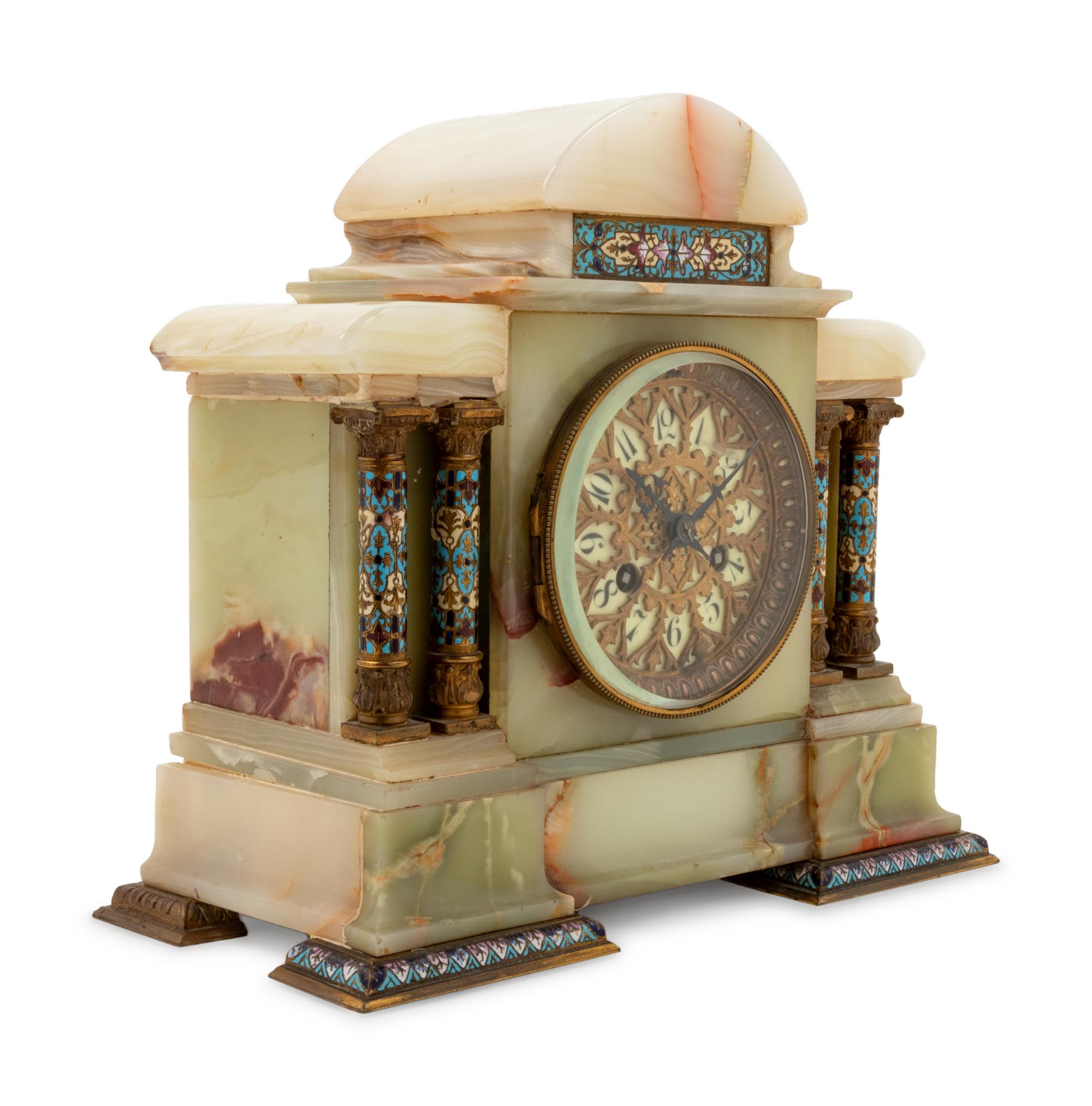 A French Onyx and Champlevé Mantel Clock