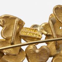 An 18K Yellow Gold Pin by Movado