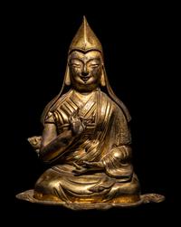 A Tibetan Gilt Bronze Repoussé Seated Figure of Tsongkhapa