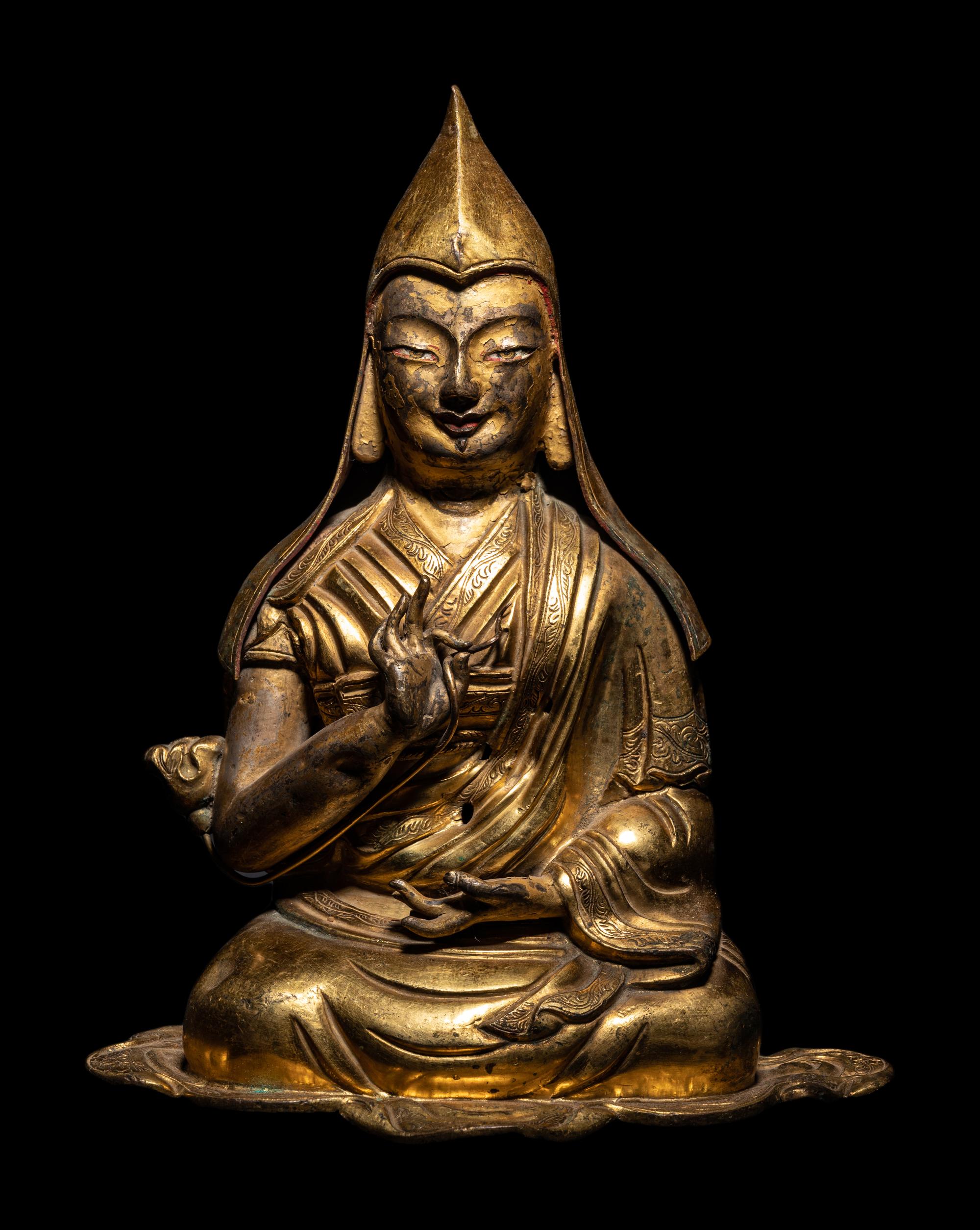 A Tibetan Gilt Bronze Repoussé Seated Figure of Tsongkhapa