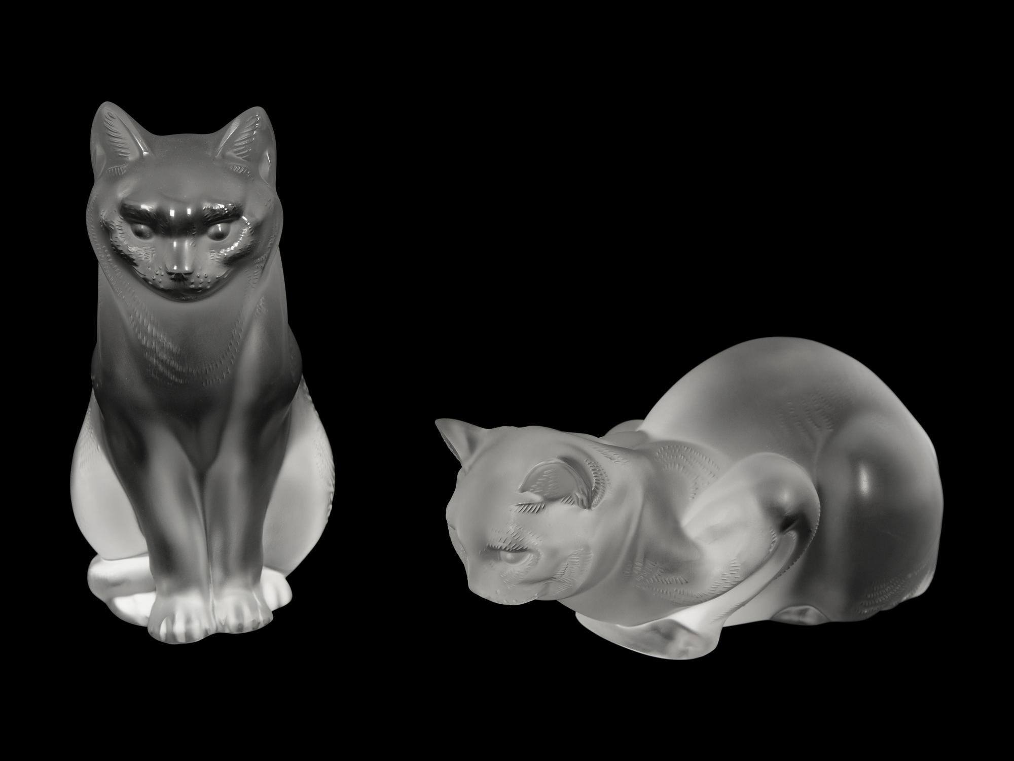 A Lalique Chat Assis Sculpture and a Lalique Chat Couche Sculpture