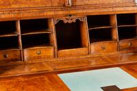 A German or Austrian Burl Walnut and Marquetry Slant-Front Bureau Bookcase