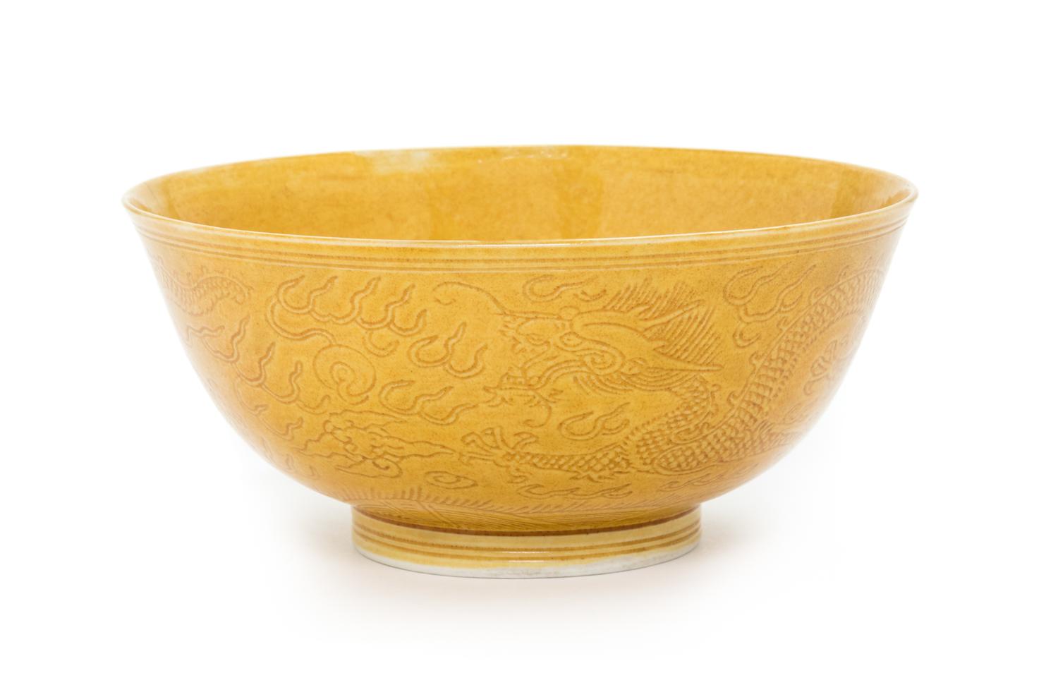 A Chinese Carved Yellow Glazed Porcelain Bowl Diameter 4 3/4 inches. — 20TH CENTURY