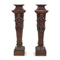 A Pair of English Carved Walnut and Marble Top Pedestals