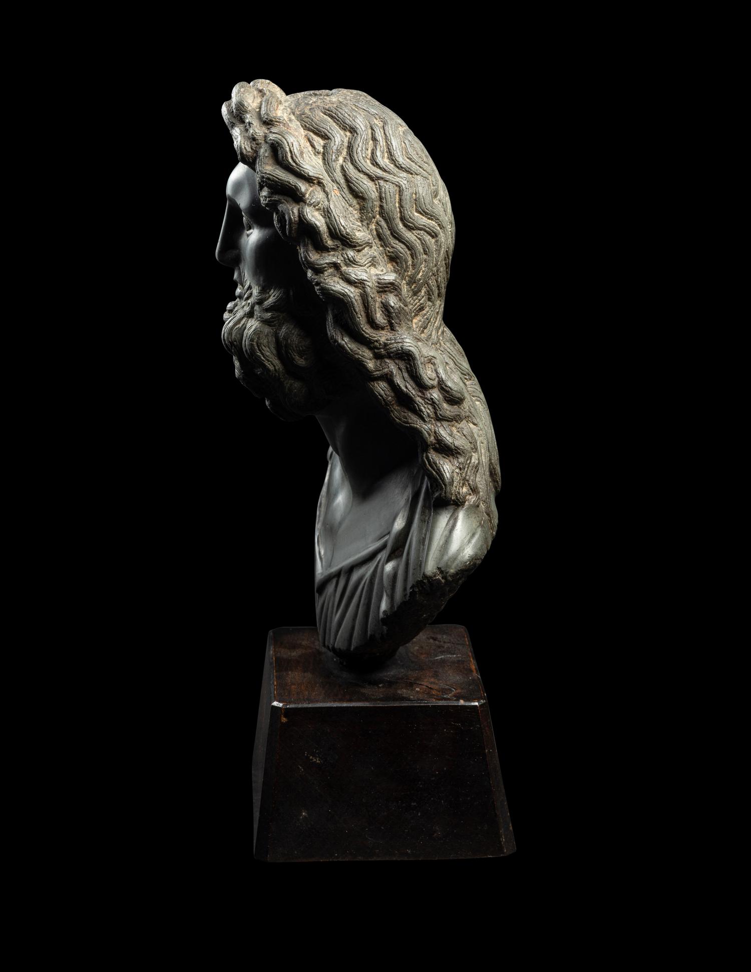 A Roman Green Schist Bust of Jupiter
