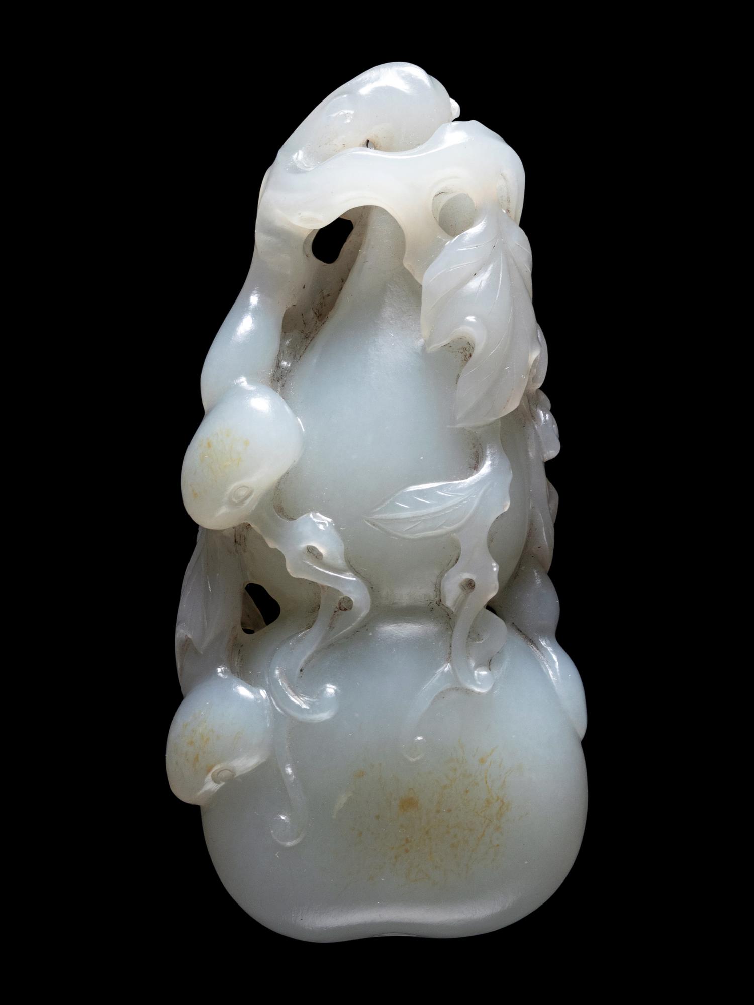 A Pale Celadon Jade Gourd-Form Pendant