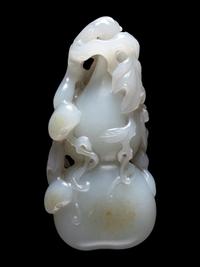 A Pale Celadon Jade Gourd-Form Pendant