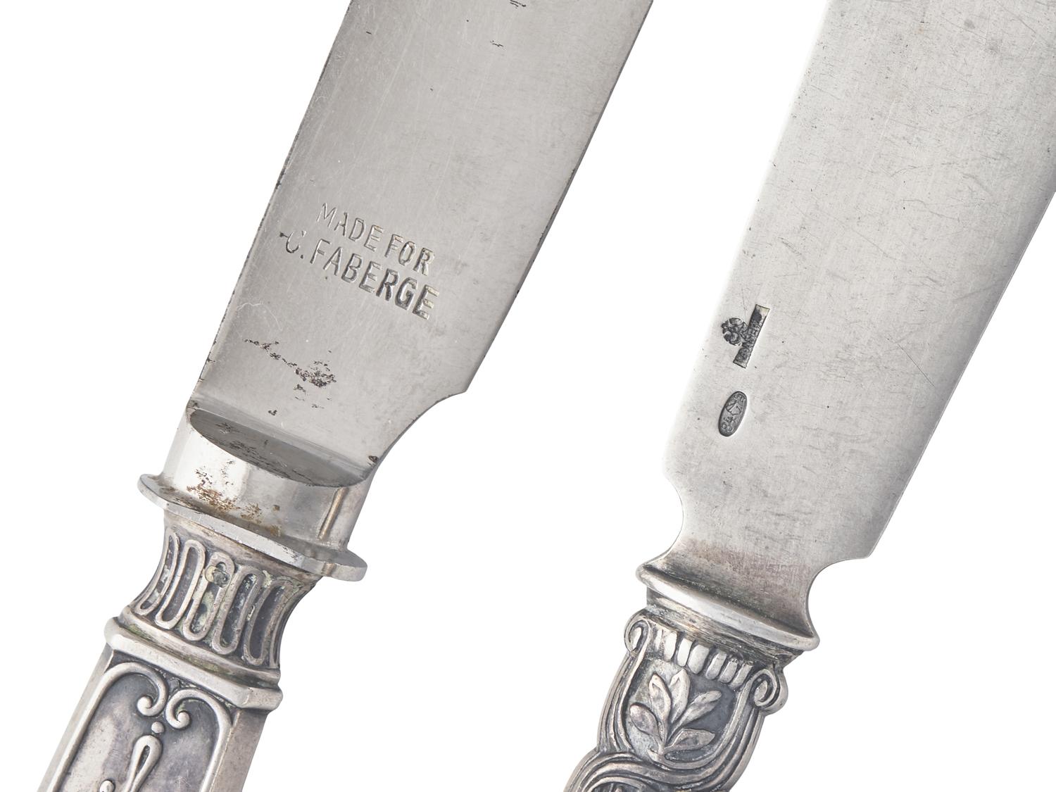 A Set of Six Russian Silver Fish Knives and a Single Russian Silver Knife