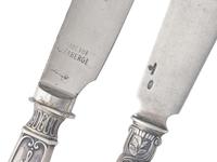 A Set of Six Russian Silver Fish Knives and a Single Russian Silver Knife