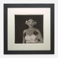 Diane Arbus (American, 1923-1971) Lady at a Masked Ball with Two Roses on her Dress, N.Y.C.
