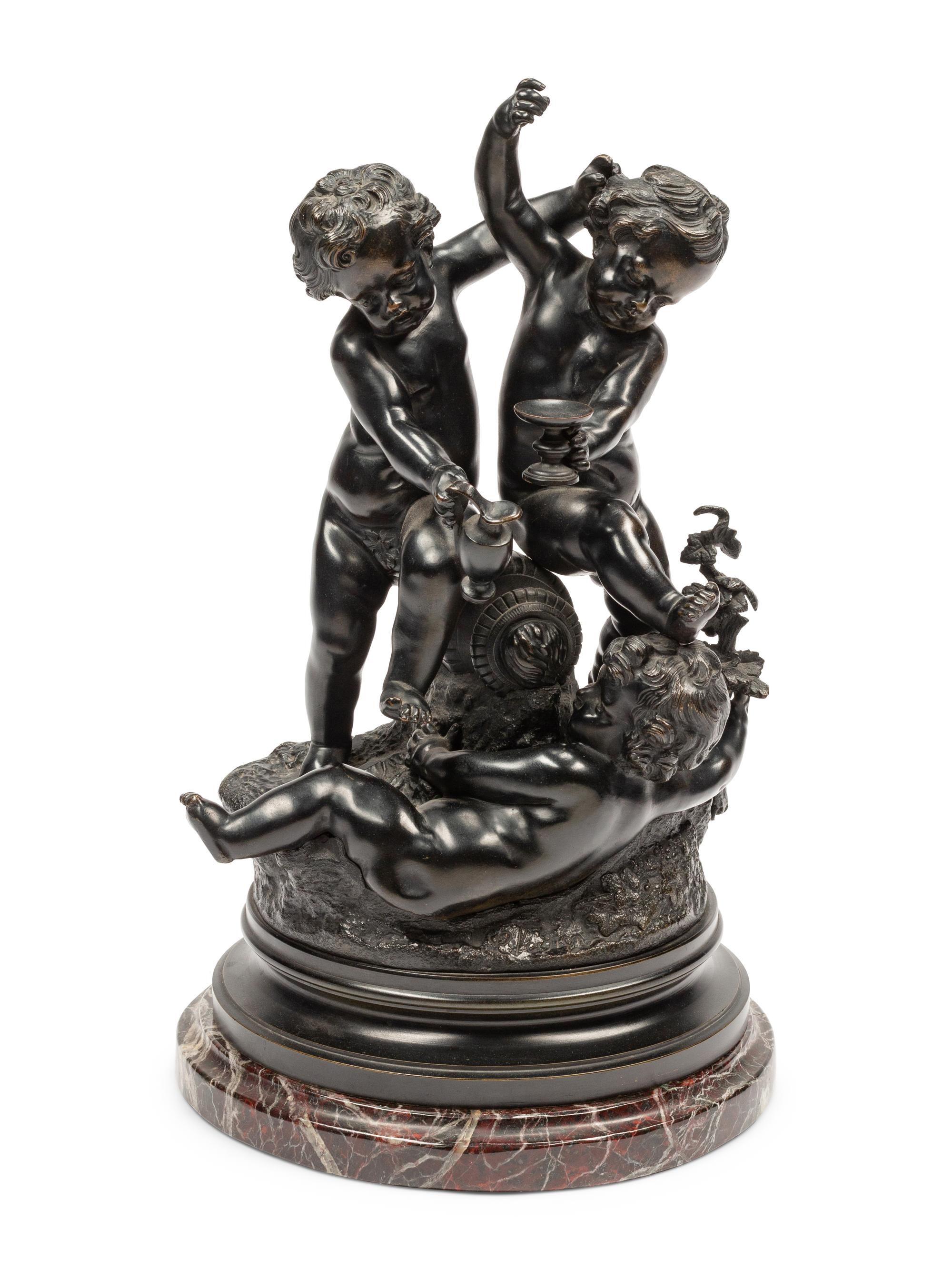 A Continental Patinated Bronze Figural Group After Claude Michel (Clodion)