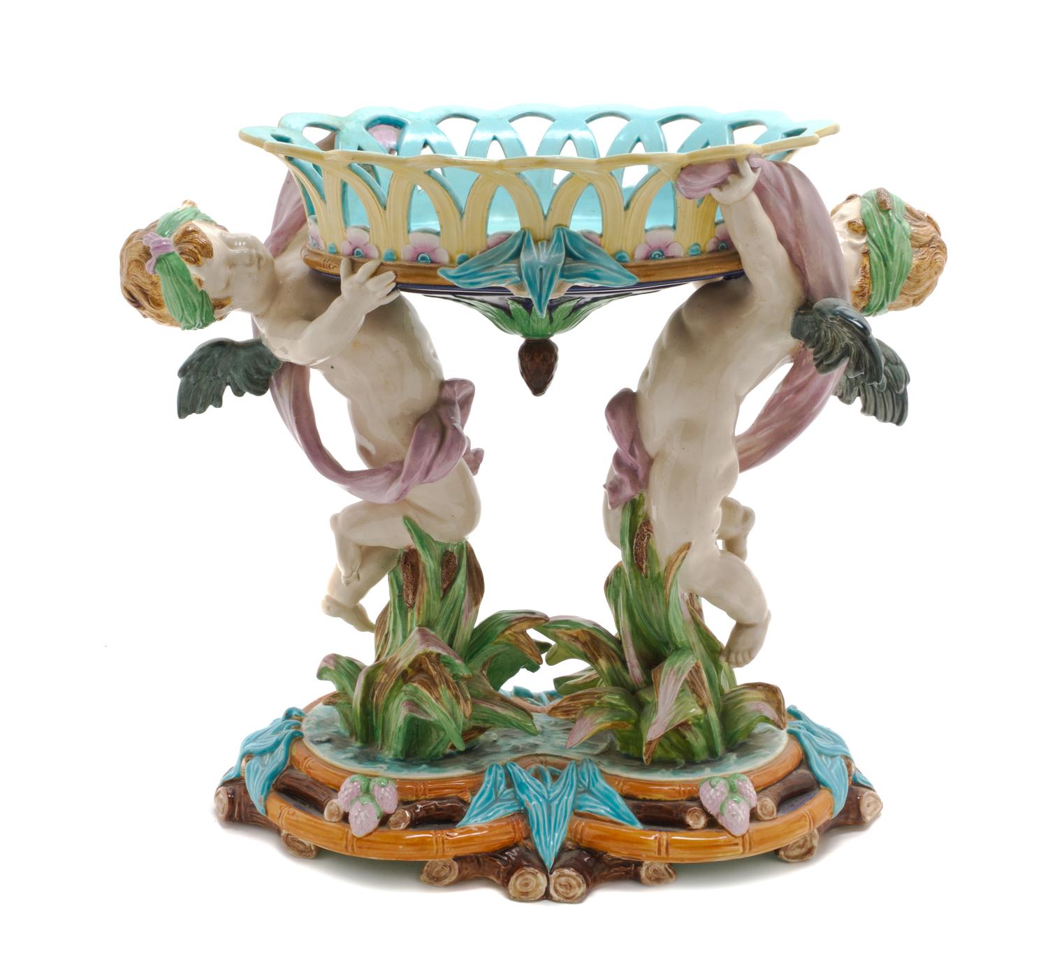 A Wedgwood Majolica Figural Centerpiece, Height 14 1/4 inches.