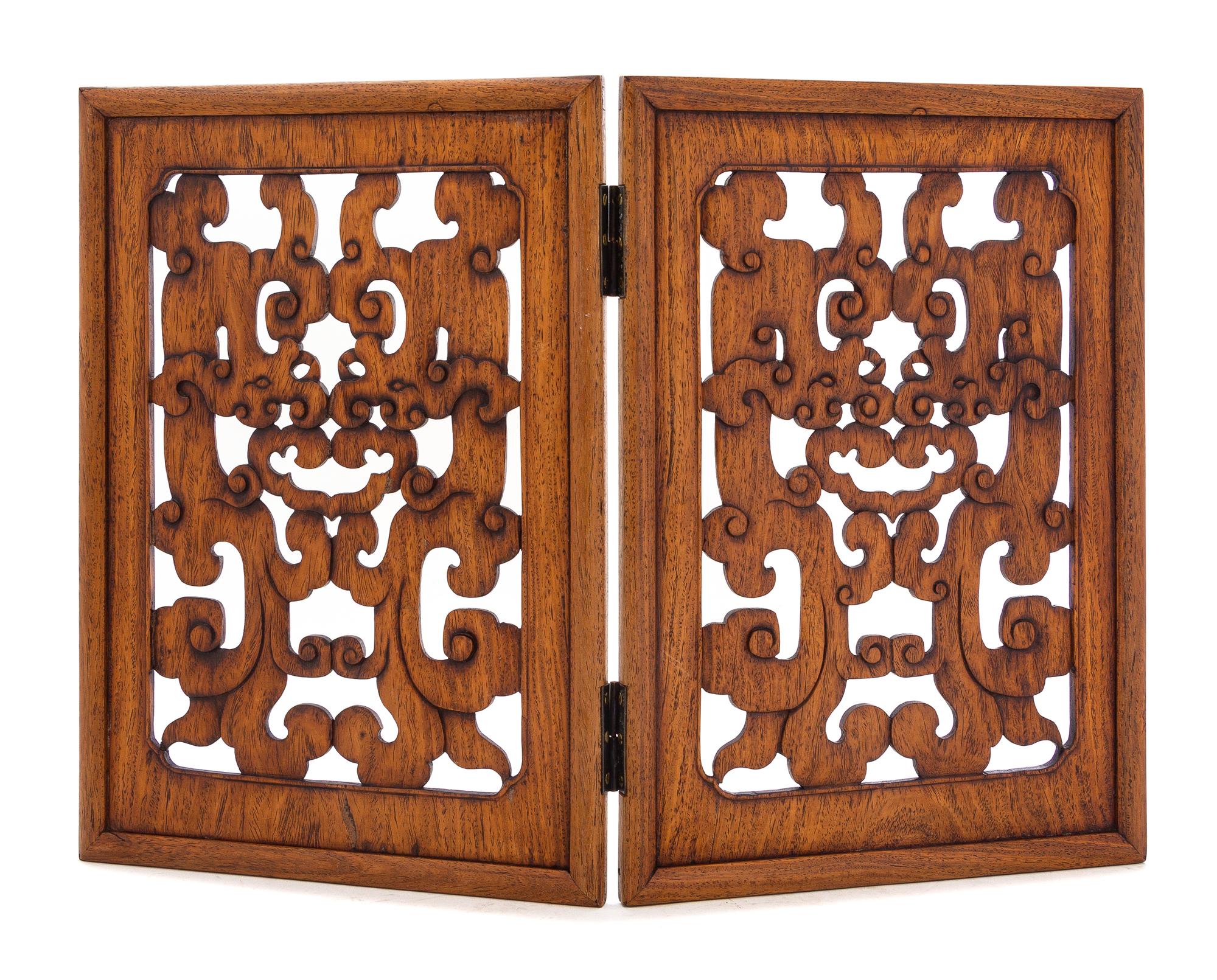 A Pair of Chinese Huanghuali Rectangular Openworked Panels Each height 15 3/8 x width 10 3/4 x depth 1 inches. — 18TH CENTURY