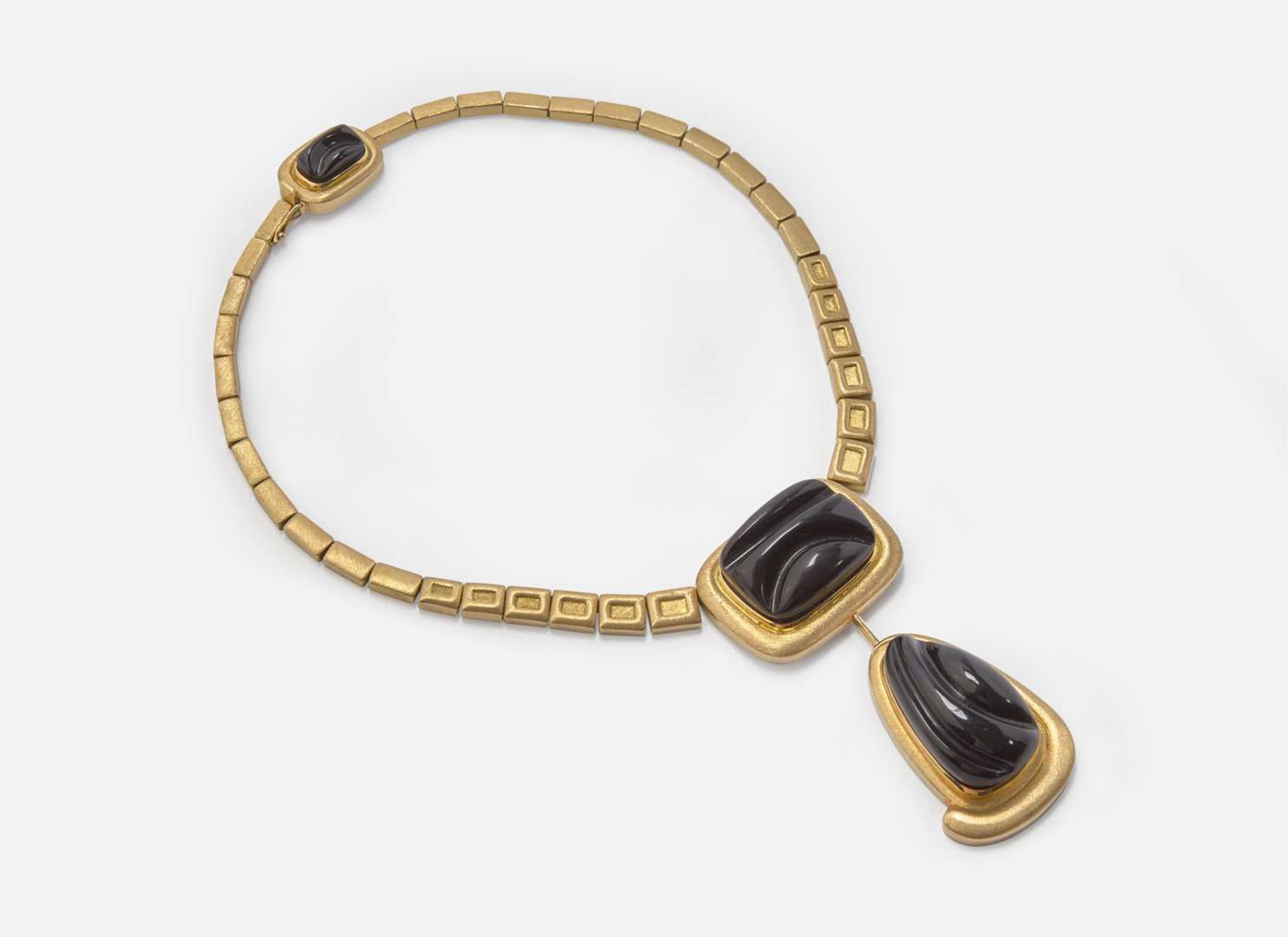 A Set of Matching Haroldo Burle Marx 18K Yellow Gold and Black Tourmaline Necklace and Ear Clips