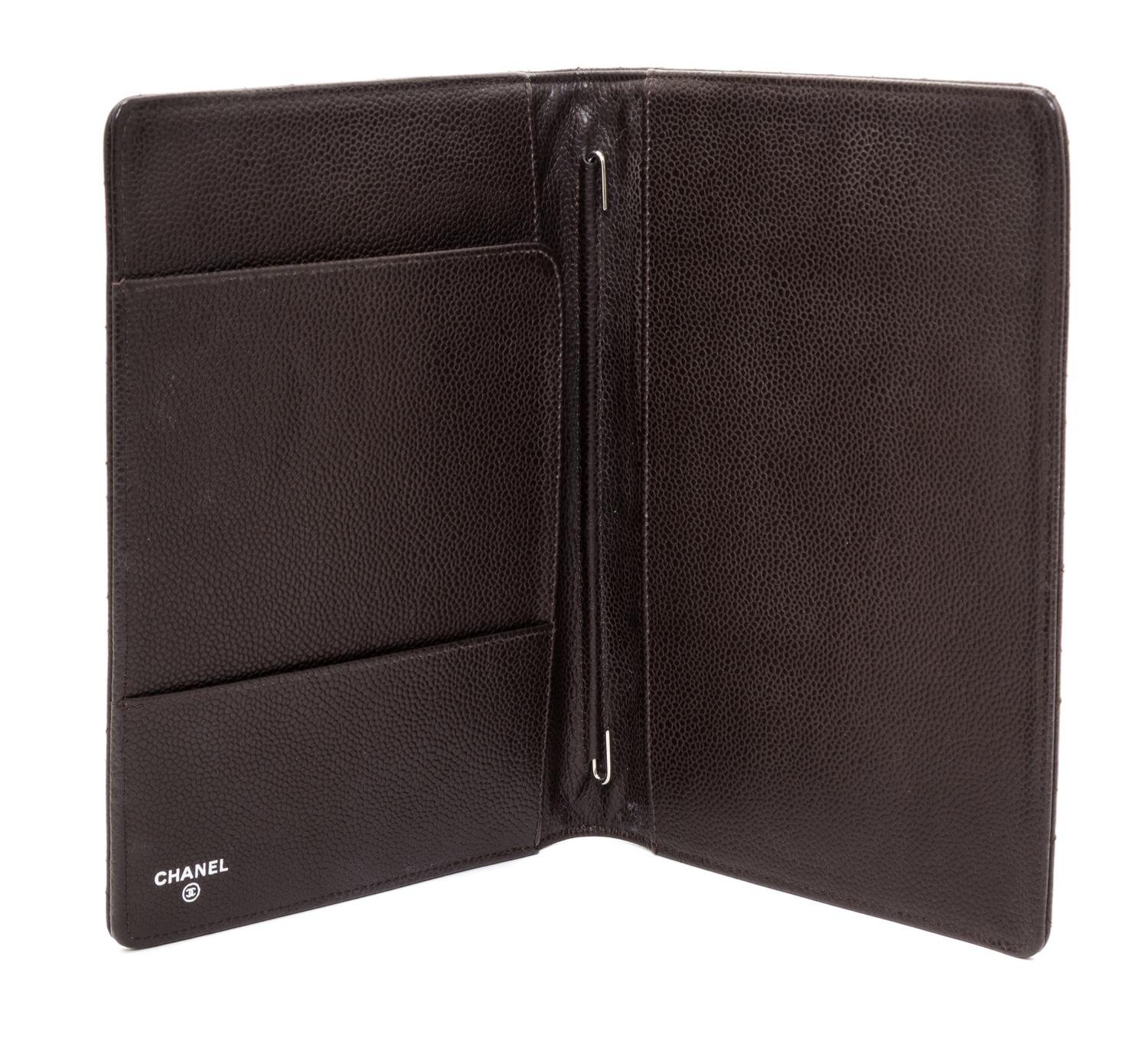 A Chanel Brown Caviar Quilted Leather Portfolio, 6.5" x 8.75" x .75".