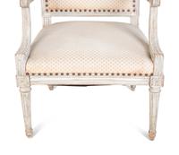 A Louis XVI Style Carved and Painted Fauteuil — 20TH CENTURY