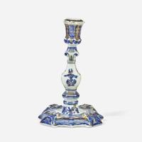 A Chinese Export porcelain blue and white candlestick with gilt decoration and pair of shell-form salts circa 1740-1755