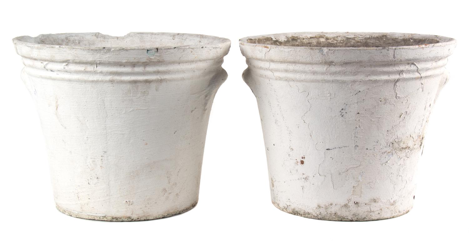 A Group of Five Concrete Planters Height of largest 13 1/2 inches x diameter 17 inches.