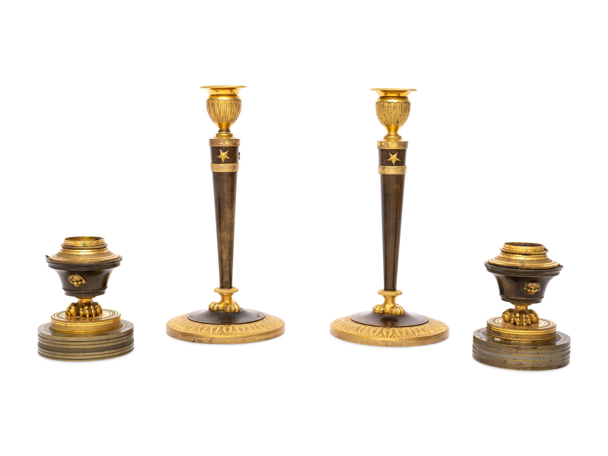 Two Pairs of Empire Gilt Bronze Candlesticks