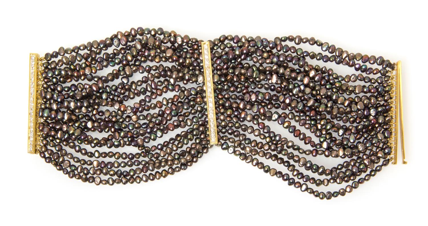 A 18 Karat Yellow Gold, Diamond and Multi-Strand Cultured Pearl Bracelet,