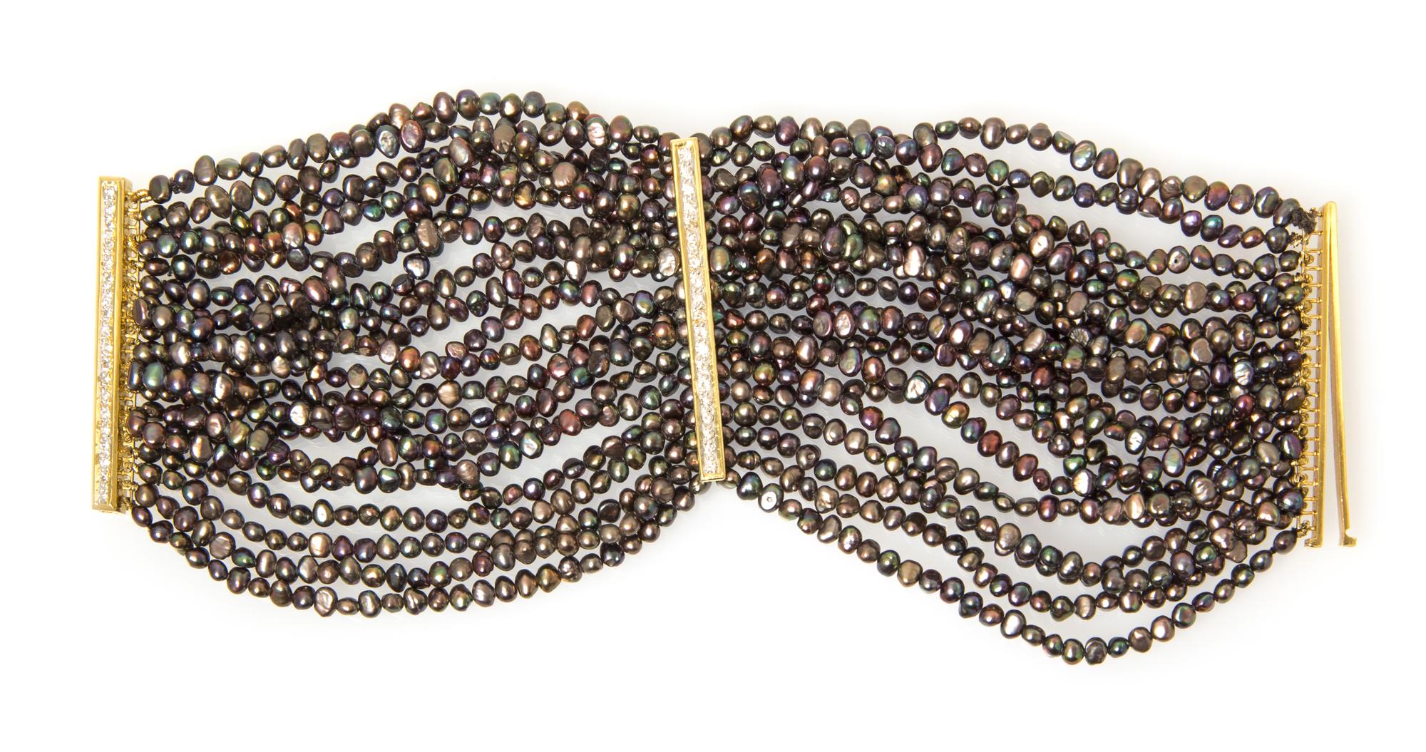 A 18 Karat Yellow Gold, Diamond and Multi-Strand Cultured Pearl Bracelet,