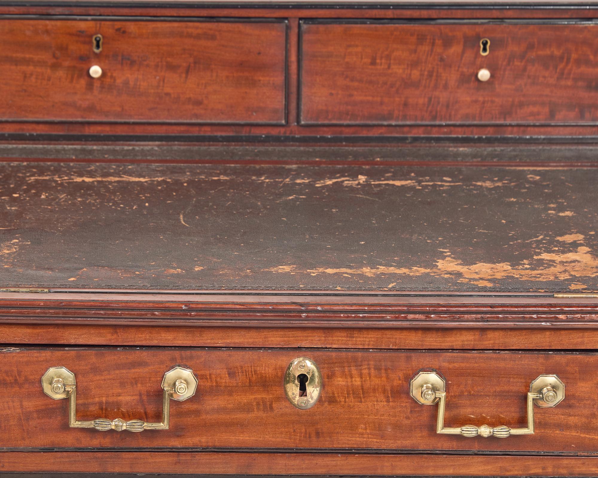 An English Satinwood, Mahogany and Parcel-Ebonized Carlton House Desk Once Owned by William Vincent Astor (1891-1959)