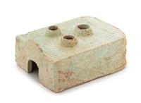 A Chinese Green Glazed Pottery Model of a Stove Length 8 3/4 x width 6 1/2 x height 3 inches. — HAN DYNASTY (206 B.C. - A.D. 220)