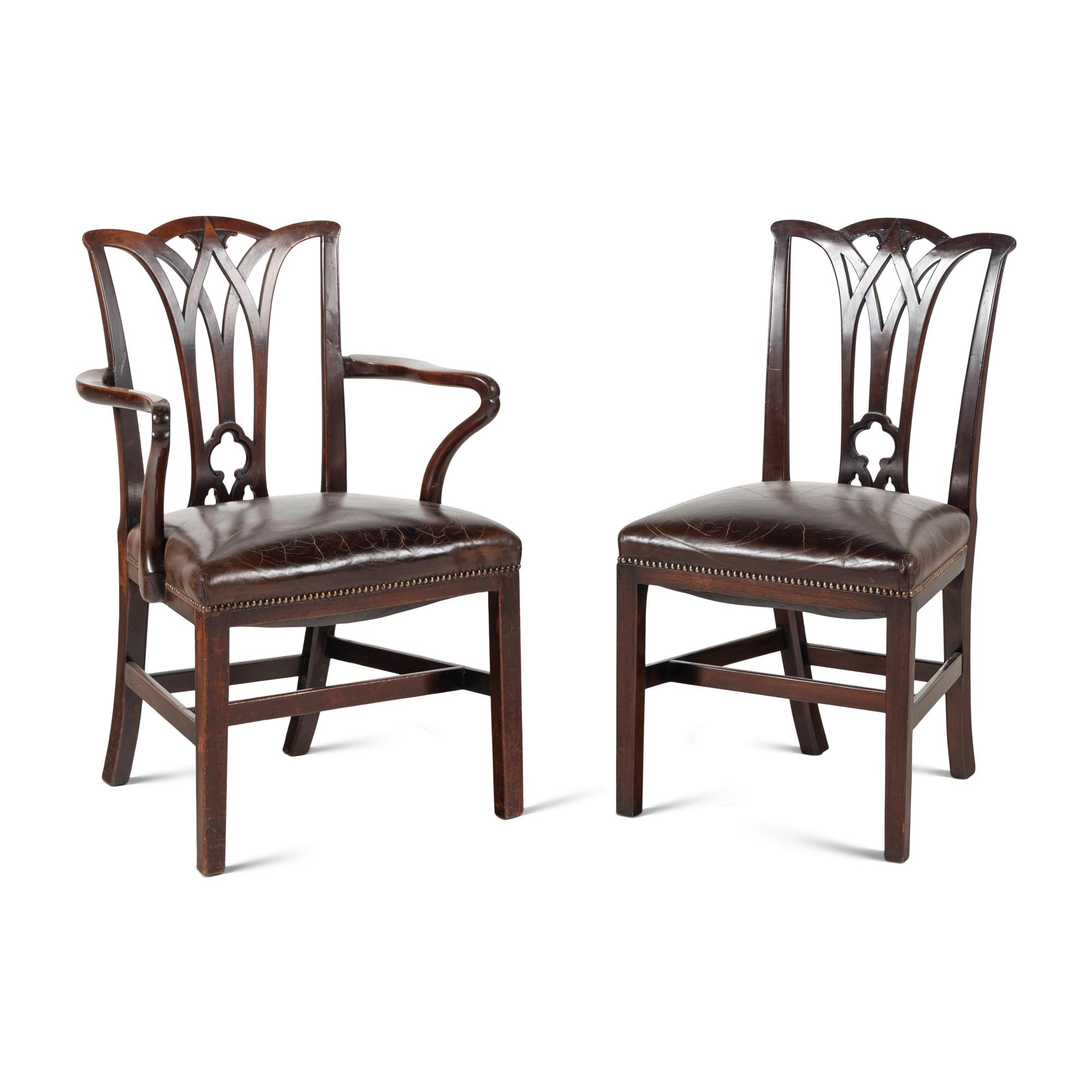 A Set of Fourteen English Mahogany Dining Chairs