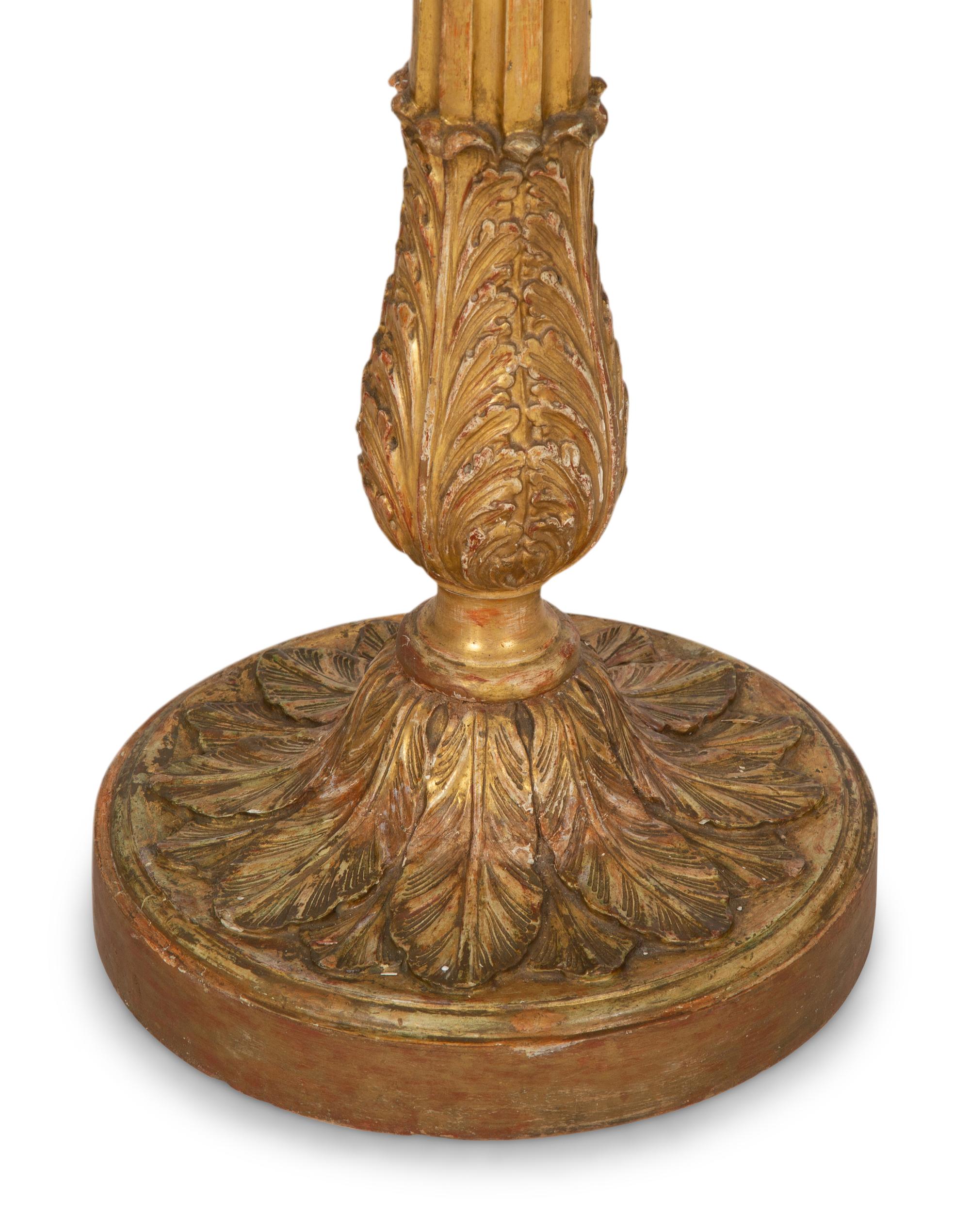 A Pair of Louis XVI Giltwood Pedestals