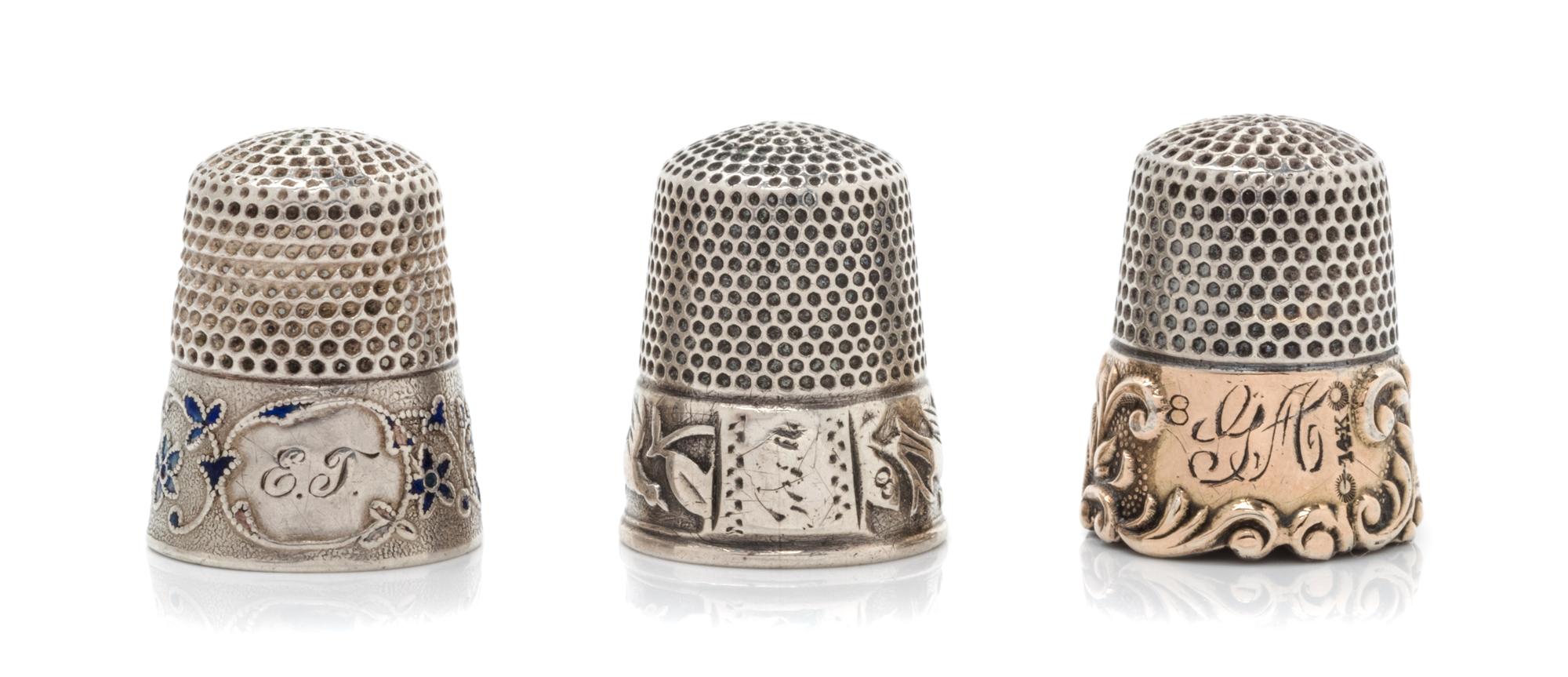 Three American Silver Thimbles, Ketcham & McDougall, New York, NY, comprising a multi-metal example with a Sterling top above a 14-kara