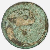 A Chinese bronze "Twin Carp" circular mirror Jin Dynasty (1115-1234)