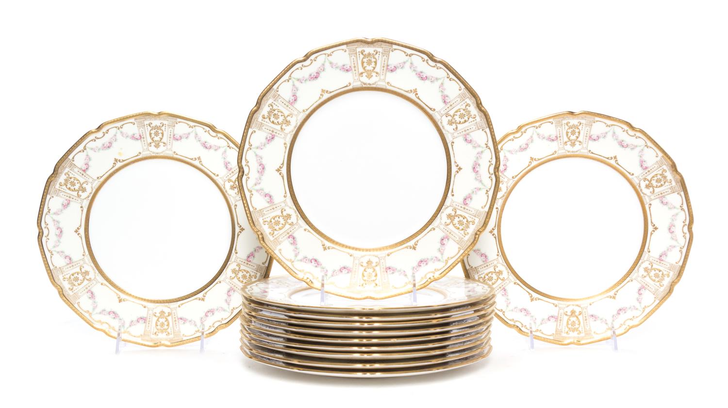 A Set of Twelve Royal Doulton Porcelain Dinner Plates Diameter 10 1/2 inches.