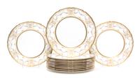 A Set of Twelve Royal Doulton Porcelain Dinner Plates Diameter 10 1/2 inches.