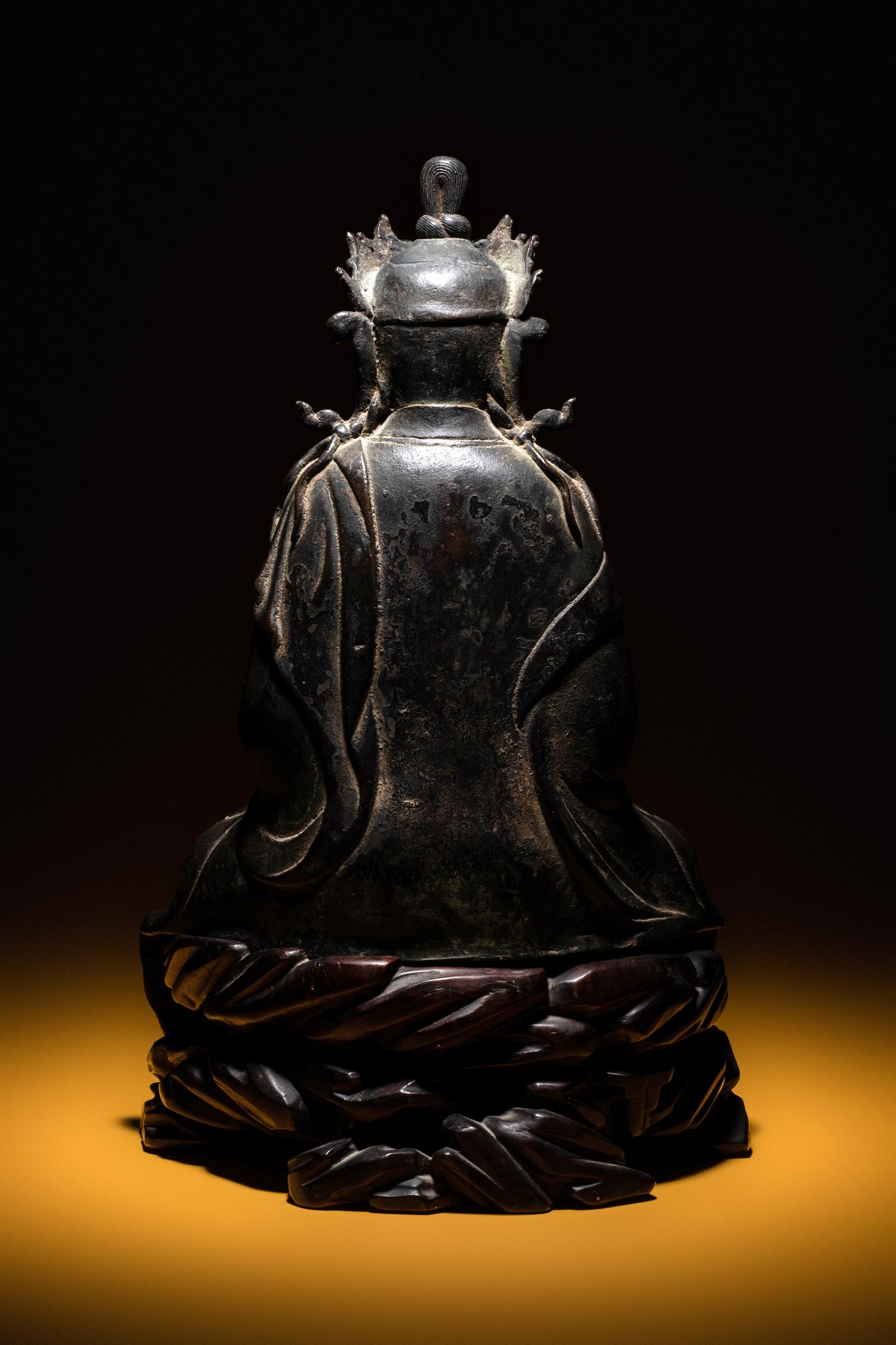 A Bronze Figure of Seated Guanyin