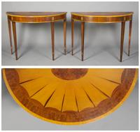 A Pair of English Demilune Console Tables, Height 33 x width 45 x depth 19 1/4 inches.