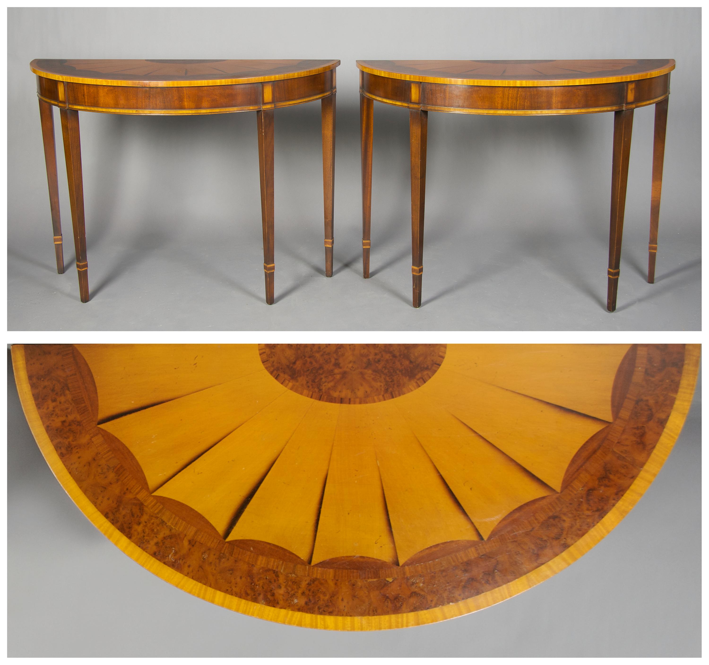 A Pair of English Demilune Console Tables, Height 33 x width 45 x depth 19 1/4 inches.