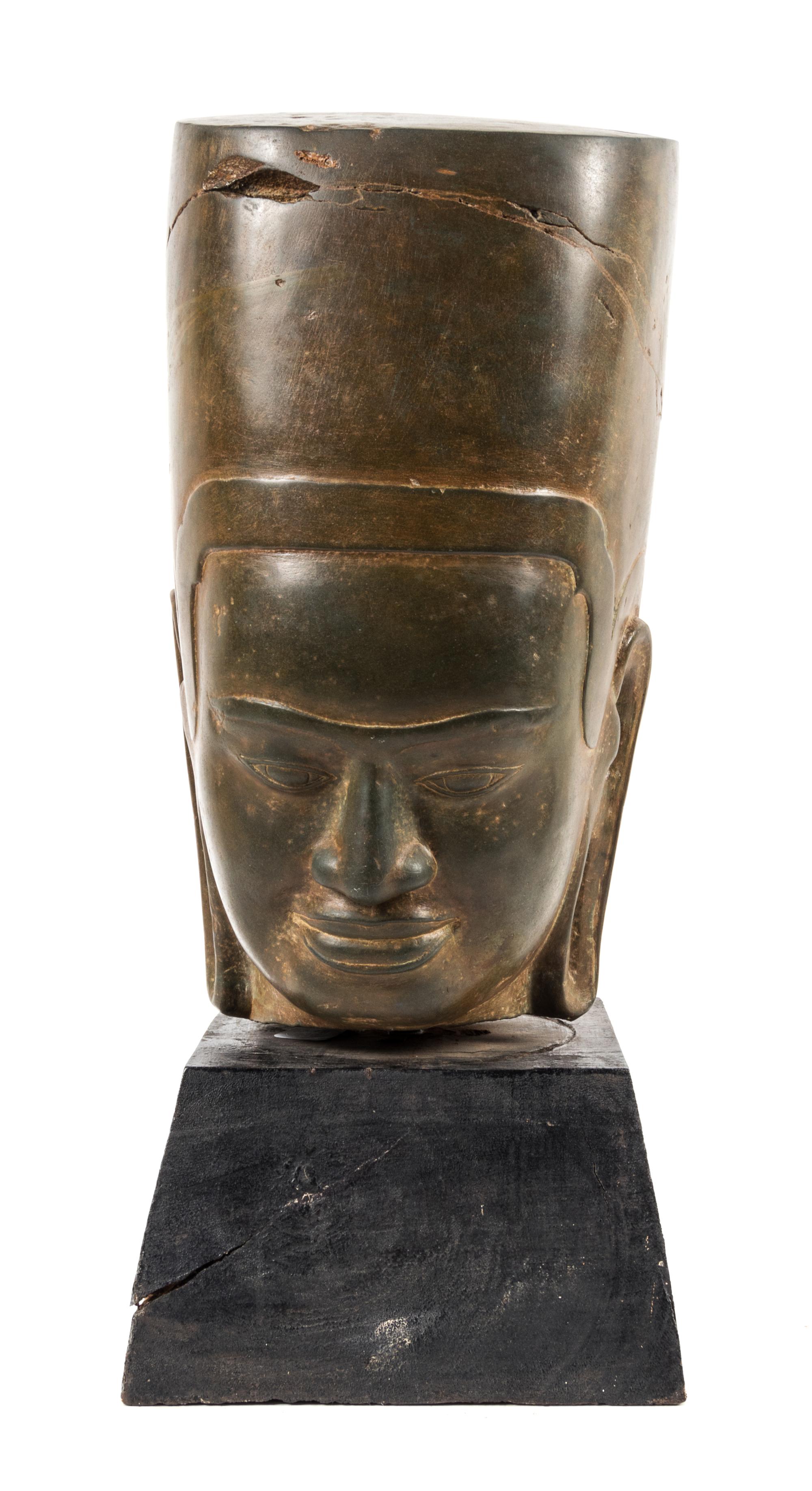 A Khmer Polished Sandstone Head of a Deity