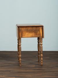 A Classical Tiger Maple Drop-Leaf Work Table