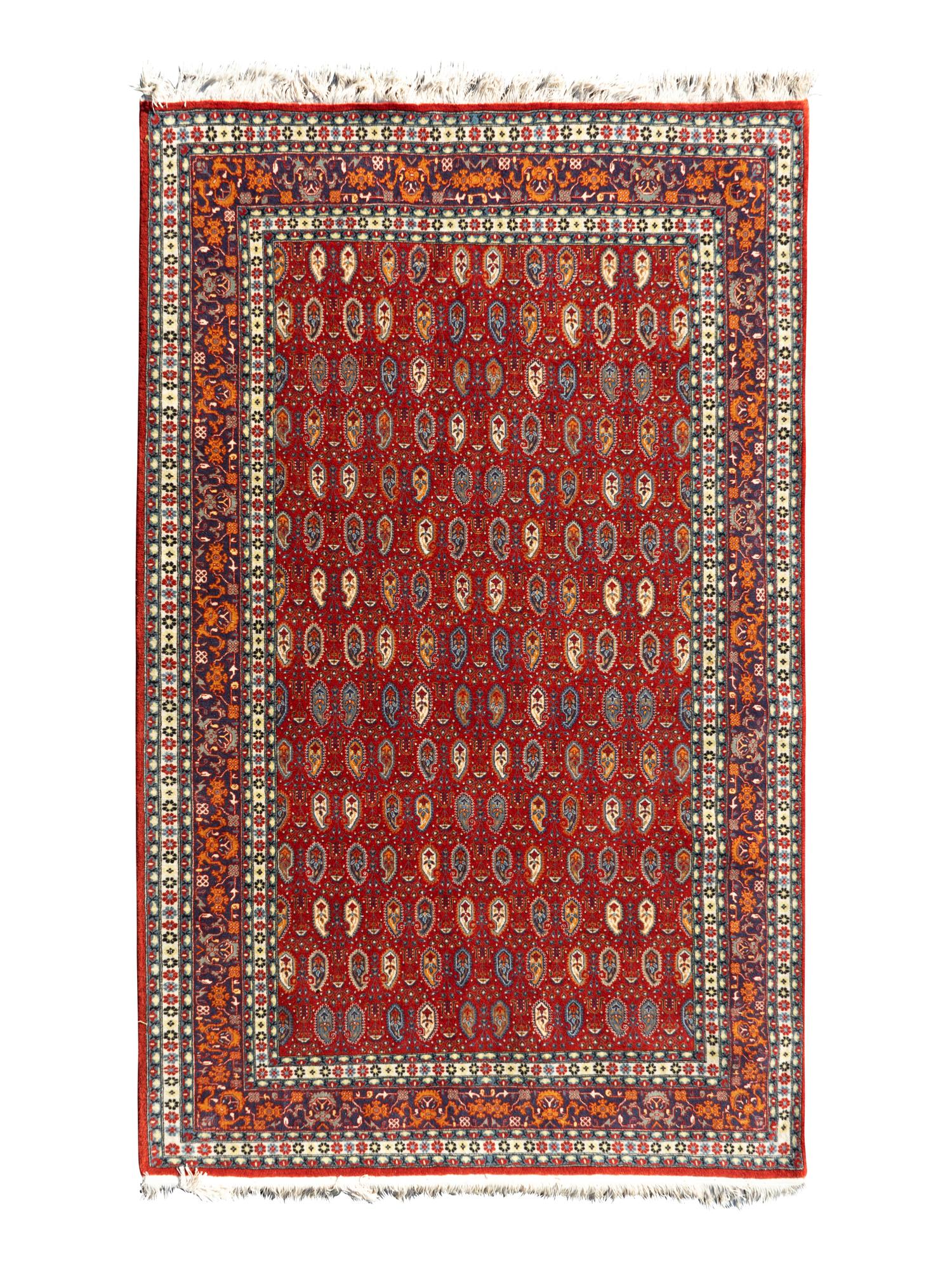 A Persian Boteh Design Wool Rug — 20TH CENTURY