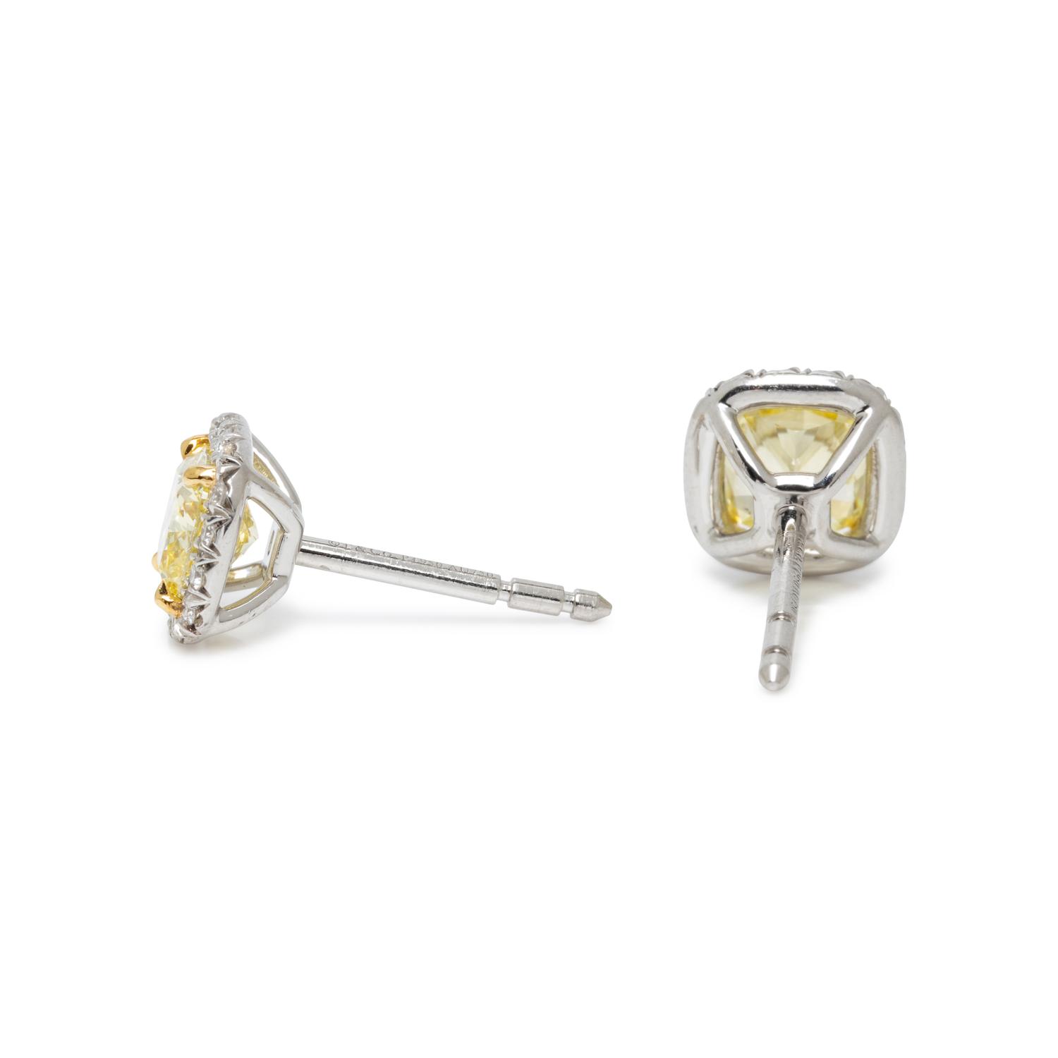 TIFFANY & CO., 'SOLESTE' FANCY INTENSE YELLOW DIAMOND AND DIAMOND STUD EARRINGS
