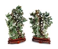A Pair of Chinese Pierce-Carved Hardstone Models of Birds in Branches
