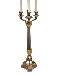 A Pair of Louis Philippe Style Gilt and Patinated Bronze Four-Light Candelabra