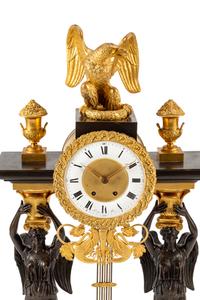 A Large Empire Style Gilt and Patinated Bronze Clock Garniture