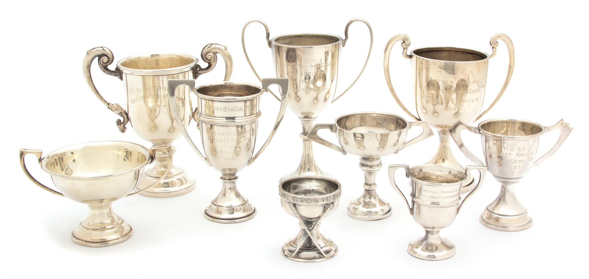 A Collection of Nine English Silver Trophy Cups, Birmingham, Various Makers and Dates, all inscribed, one with crossed polo mallets