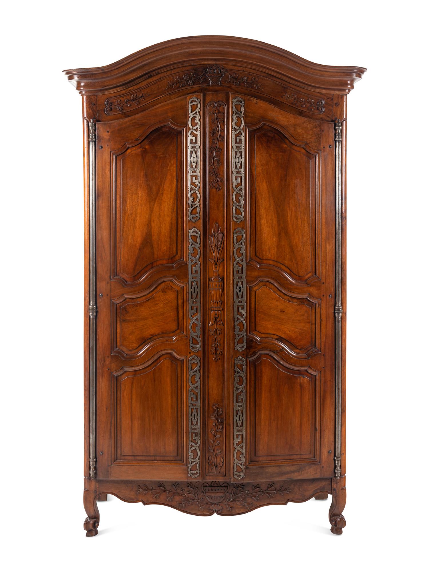 A Louis XV Provincial Walnut Armoire