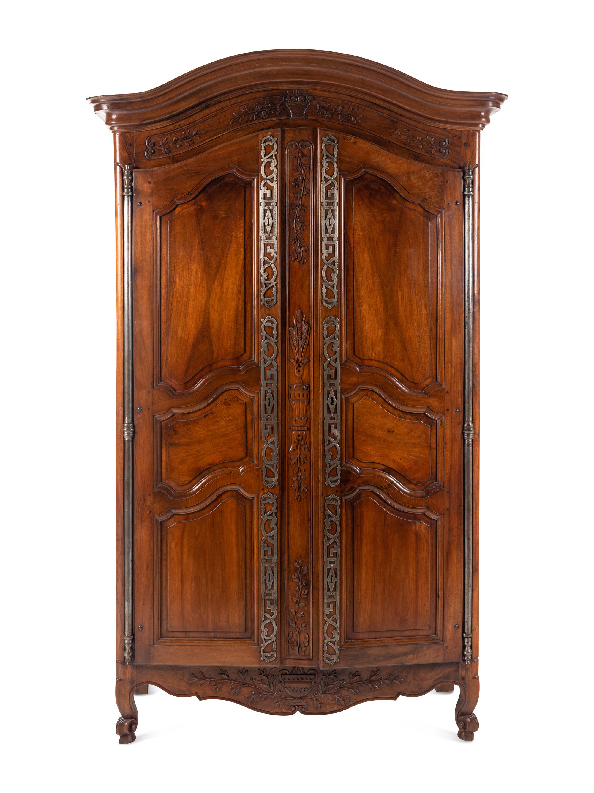 A Louis XV Provincial Walnut Armoire