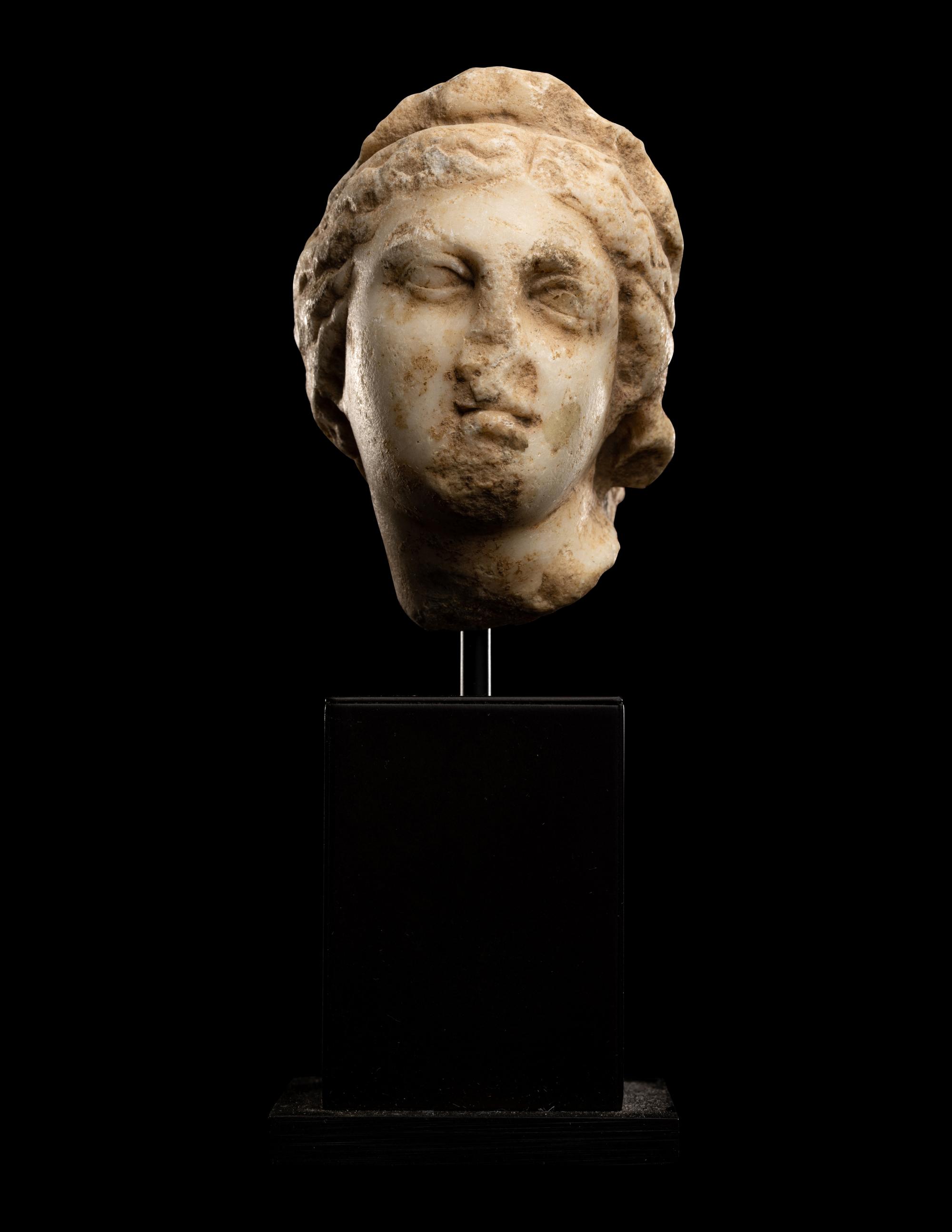 A Roman Marble Head of a Woman